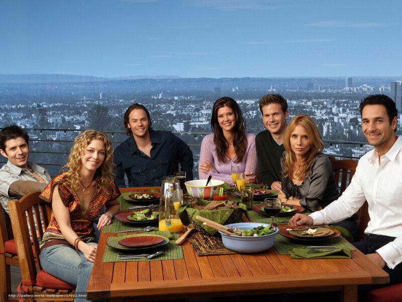Friends at dinner with city view