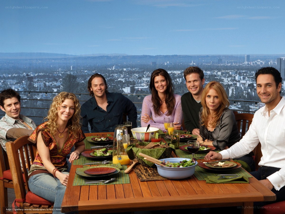 Friends at dinner with city view
