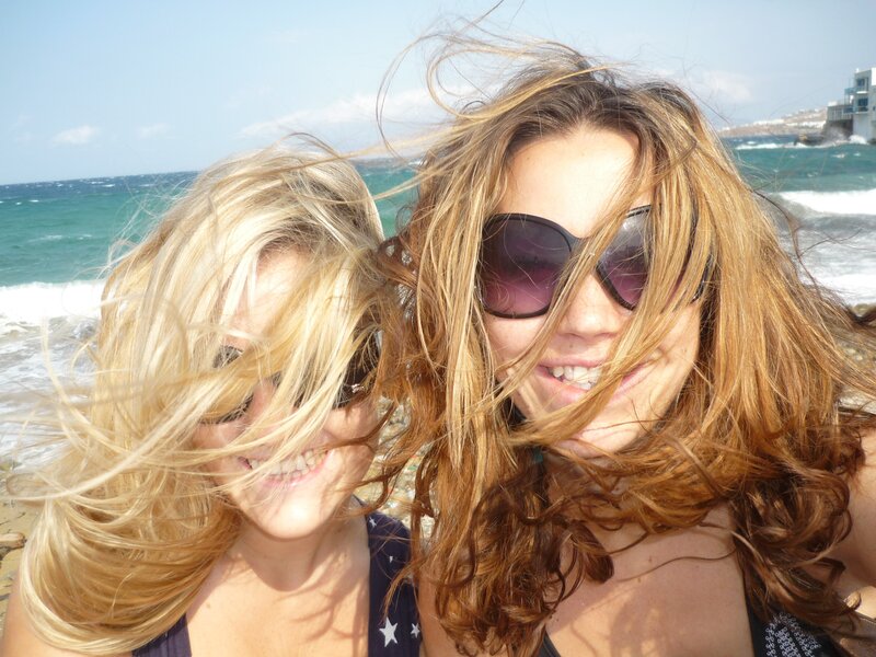 Friends at the beach on a windy day