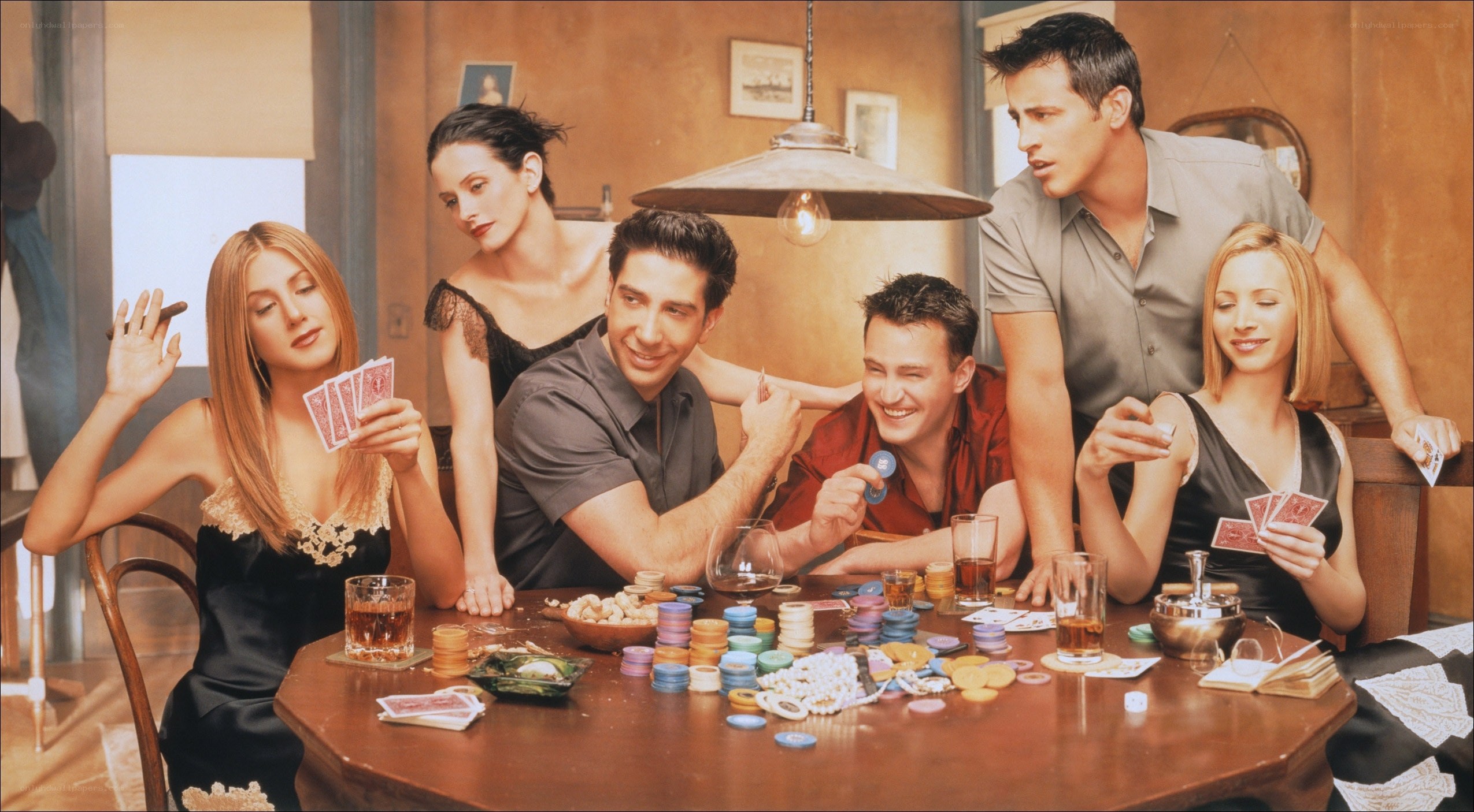 Friends cast playing poker