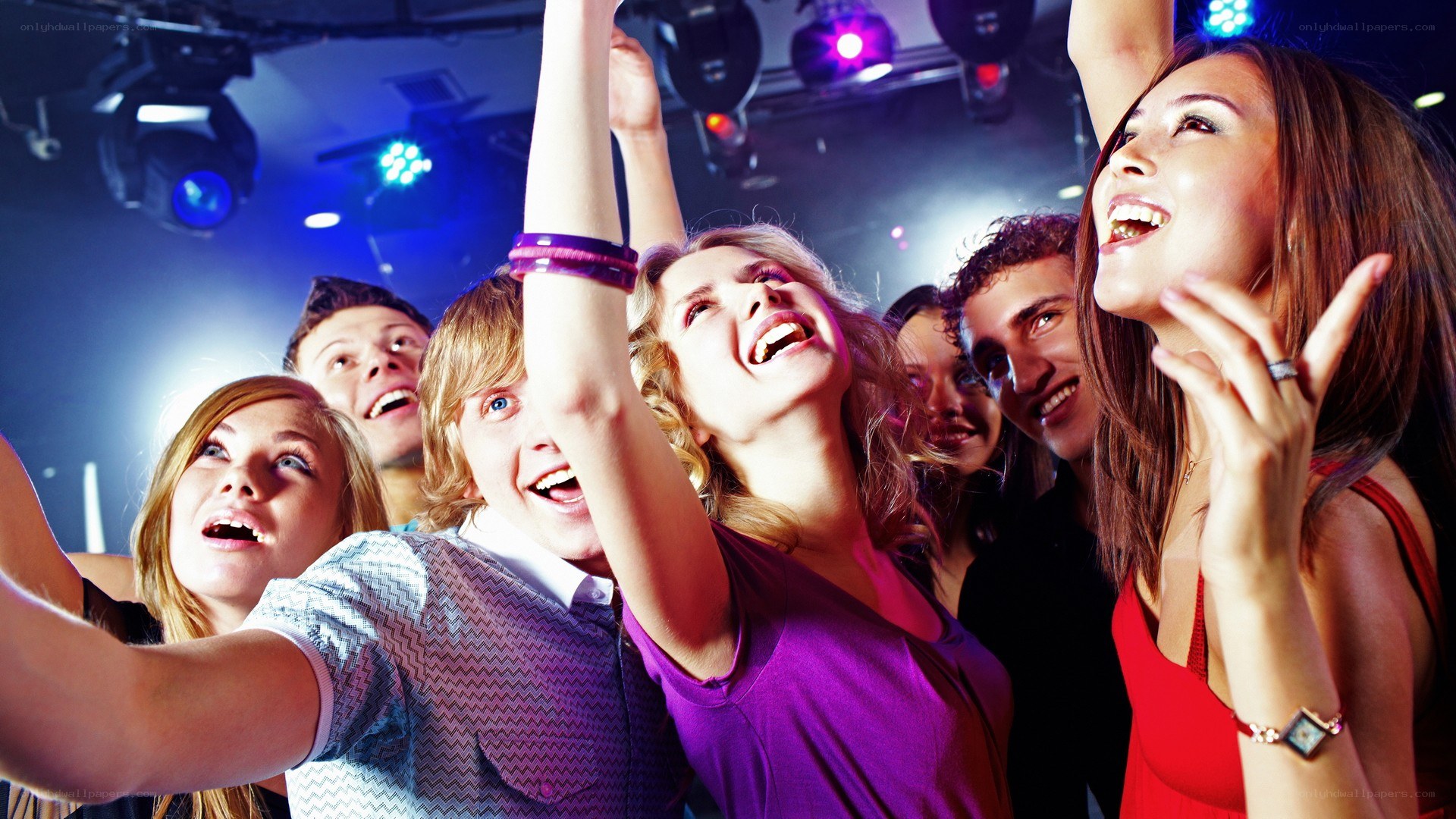 Friends dancing at a club