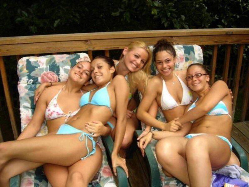 friends in bikinis on deck