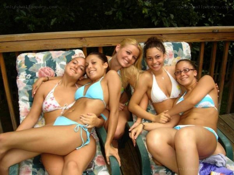 friends in bikinis on deck