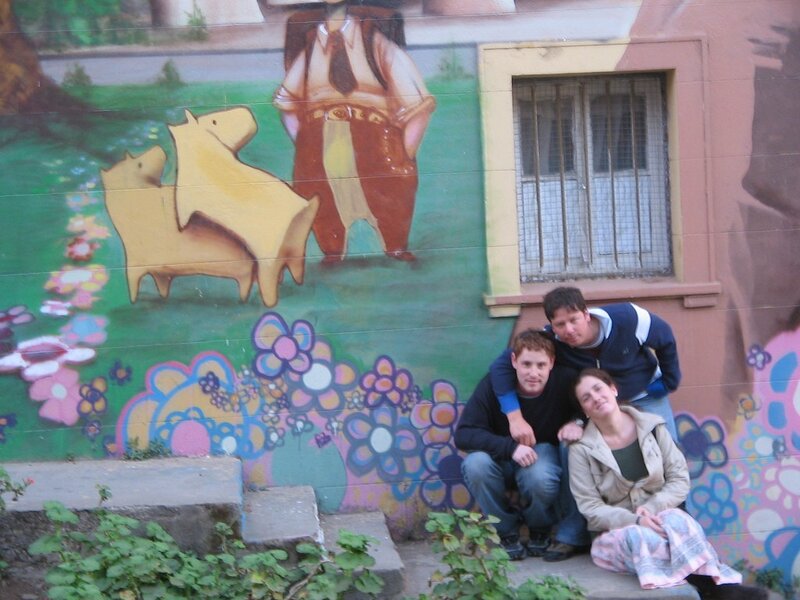 Friends in front of mural