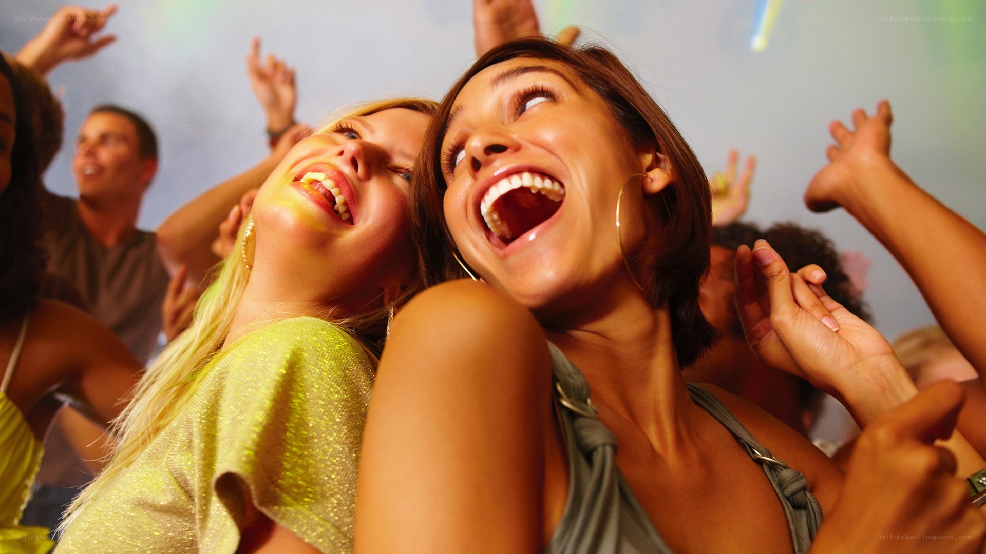 Friends laughing at a party