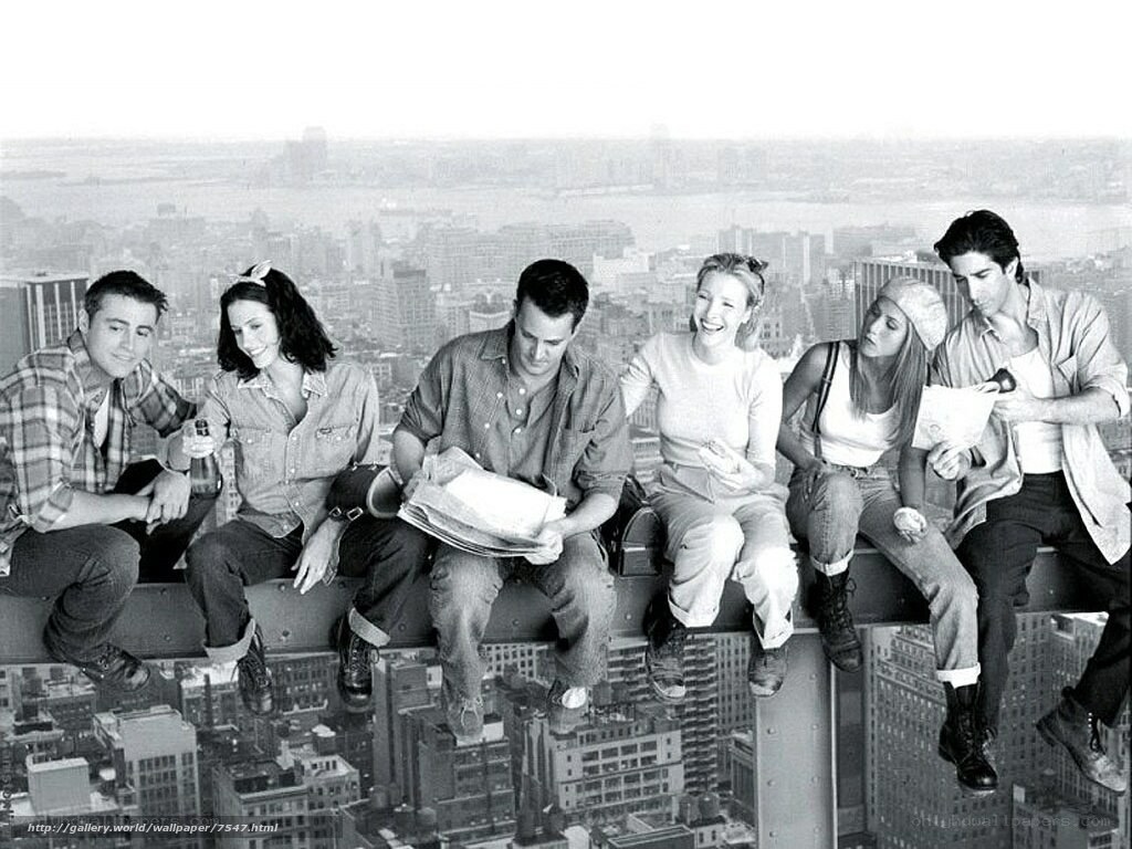 Friends on a skyscraper ledge
