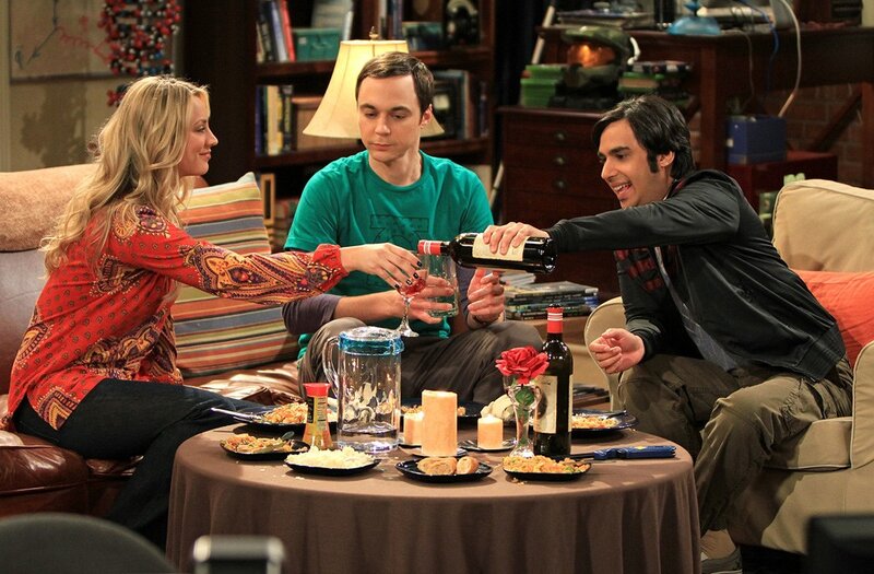 Friends sharing dinner on a couch