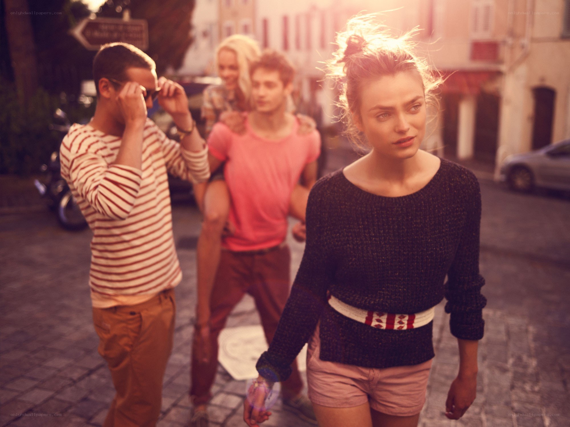 Friends walking in a city