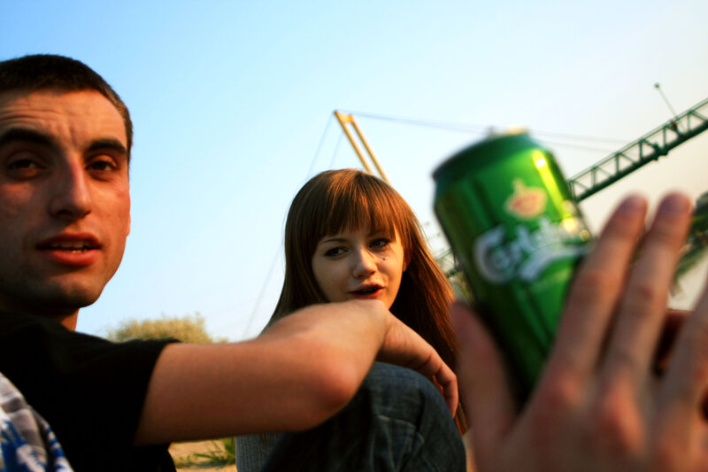 Friends with a beer can