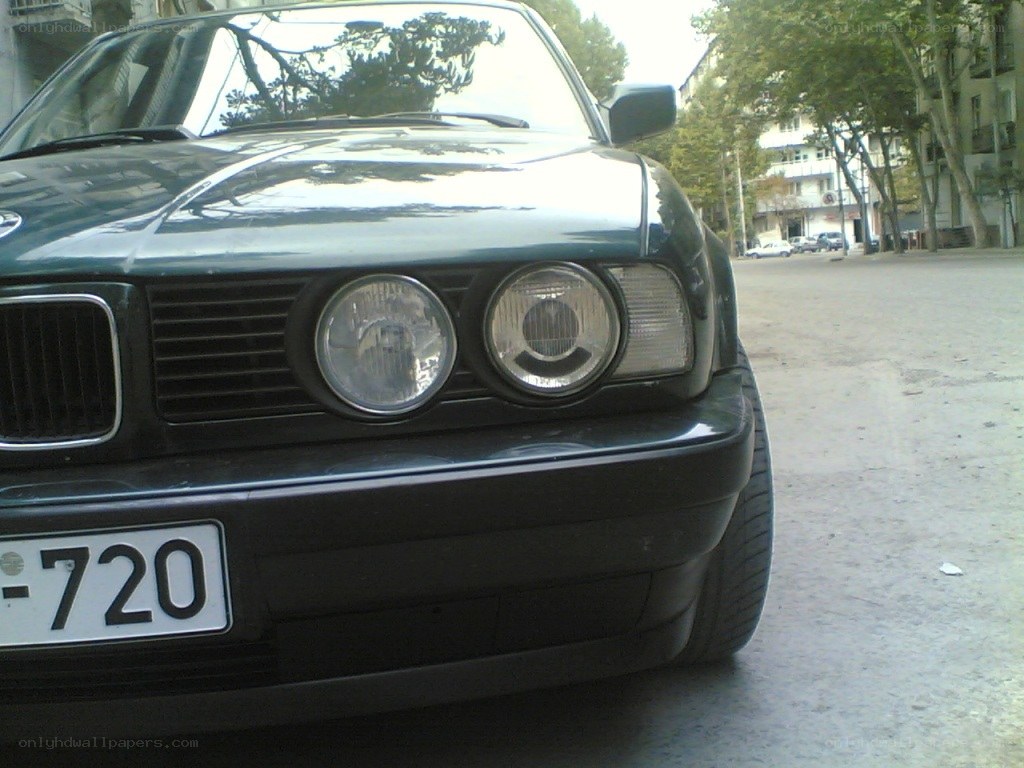 front of a black car