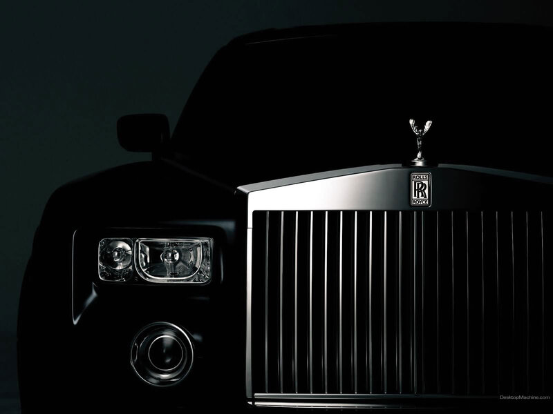 Front of Black Rolls-Royce — Dramatic