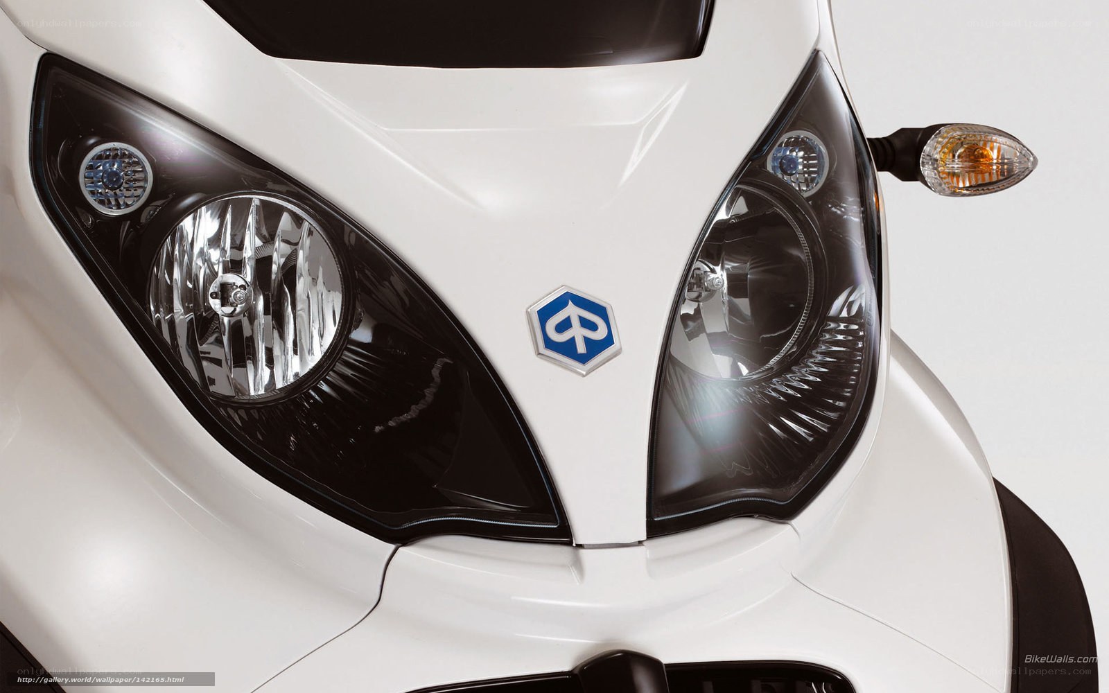 front of white scooter