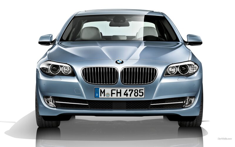 front view of a blue BMW car