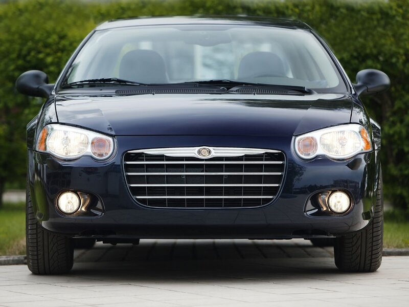 front view of a blue sedan