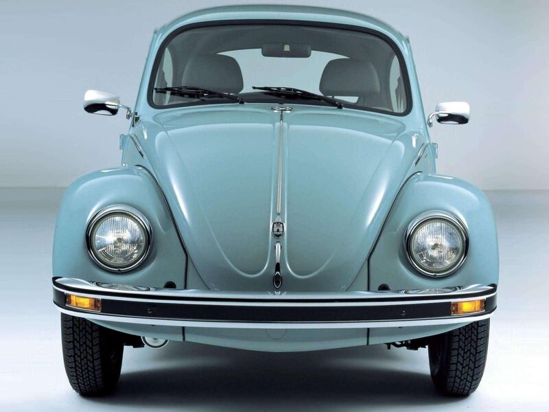 Front view of a light blue Beetle