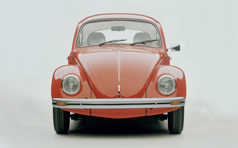 Front view of a red Volkswagen Beetle