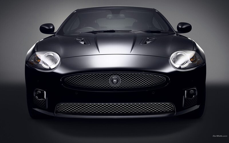 front view of black jaguar car