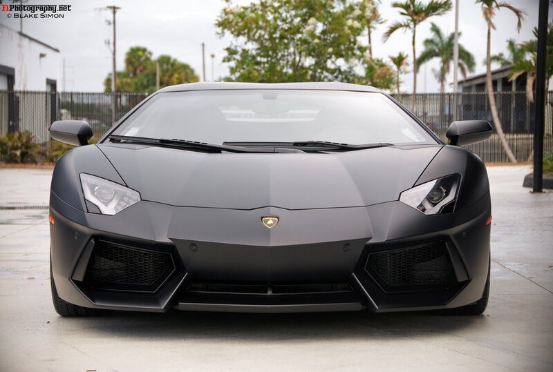 front view of matte black lamborghini