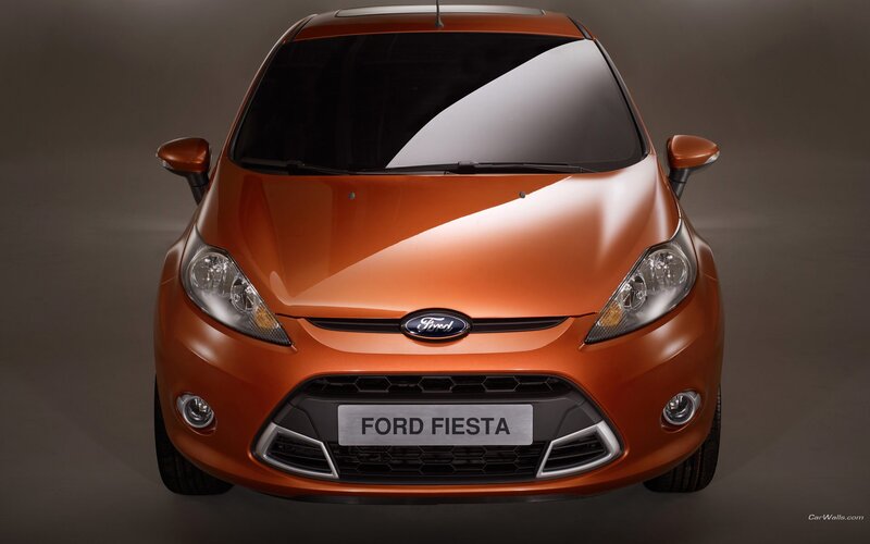Front view of orange Ford Fiesta