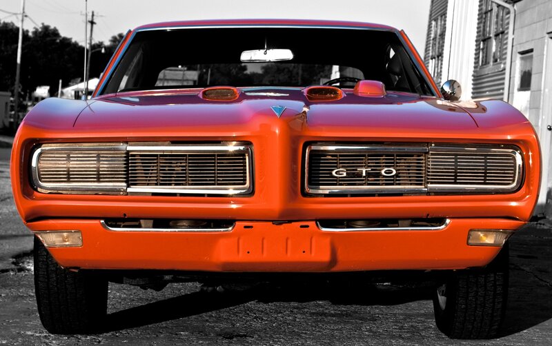 front view of orange muscle car