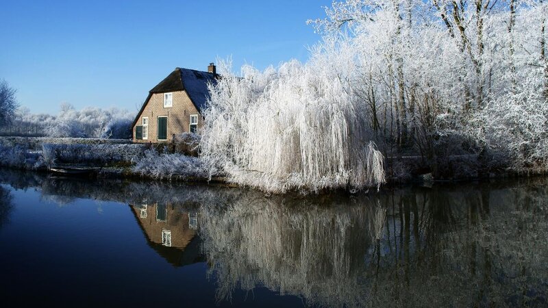 Frost-covered House by River — Blue, Serene