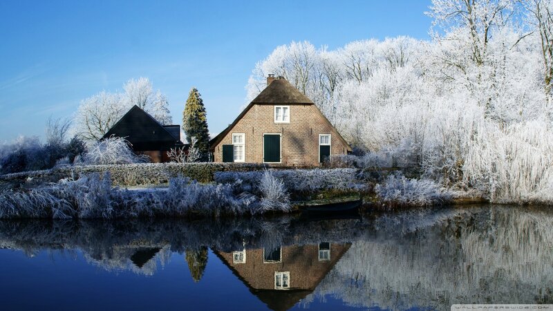 Frost-covered House by River