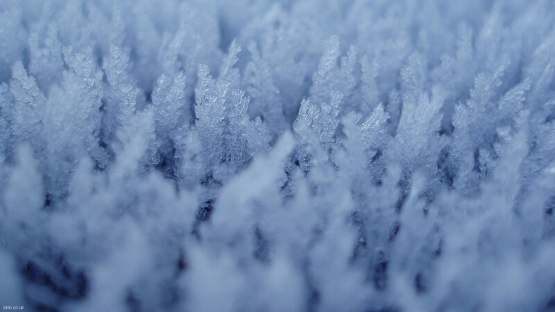 Frost Crystals on Surface — Blue