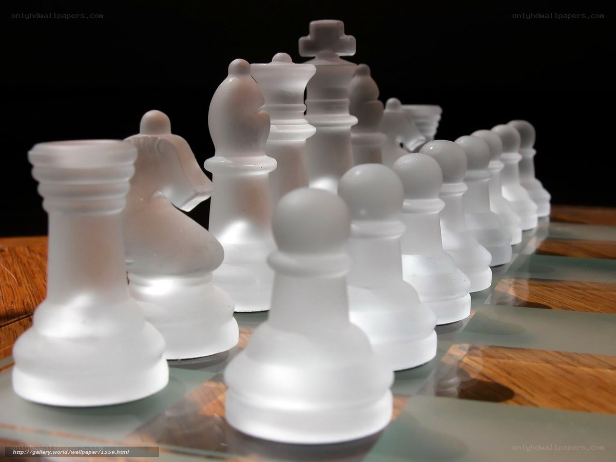 Frosted chess pieces on board