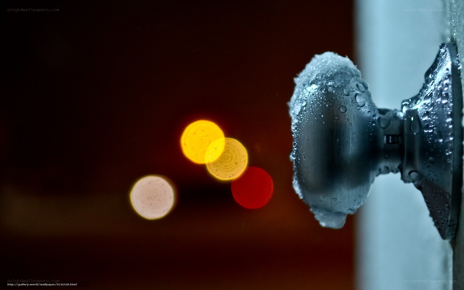 frosted doorknob with city lights