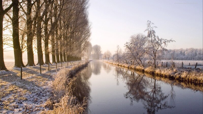 frosty canal at sunrise