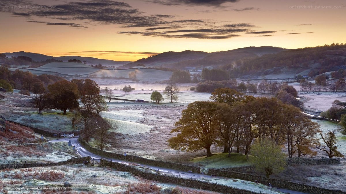 Frosty dawn over rolling hills