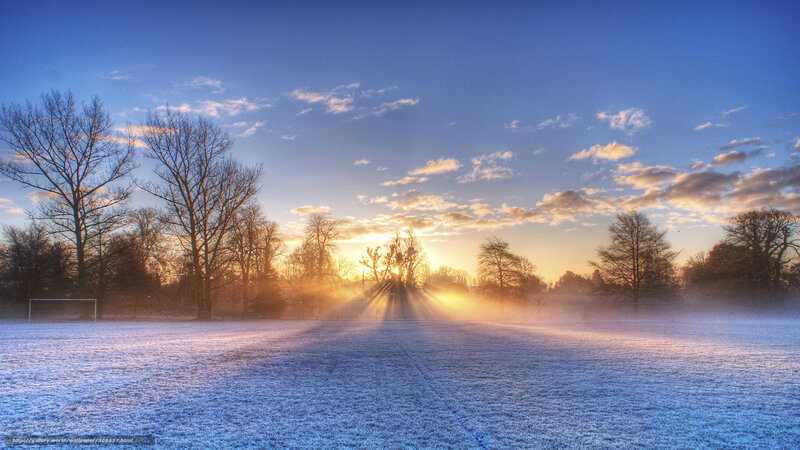 Frosty field at sunrise