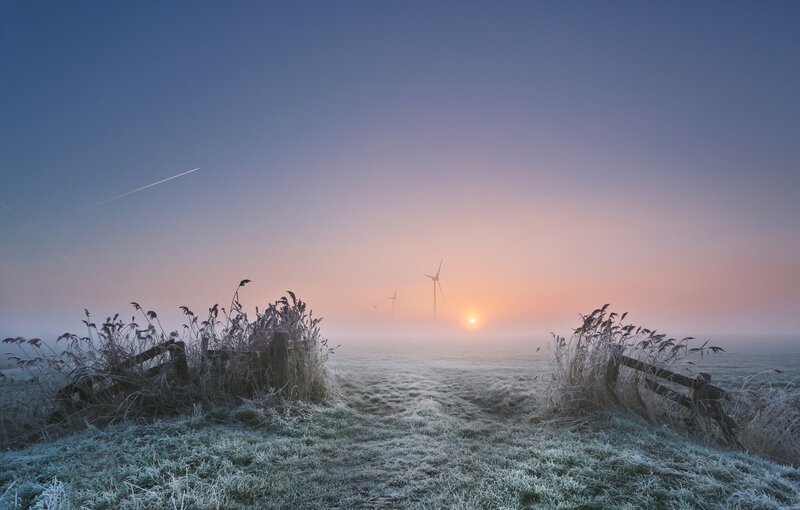 Frosty Field at Sunrise — Blue, Serene, Photograph, Wind Turbines