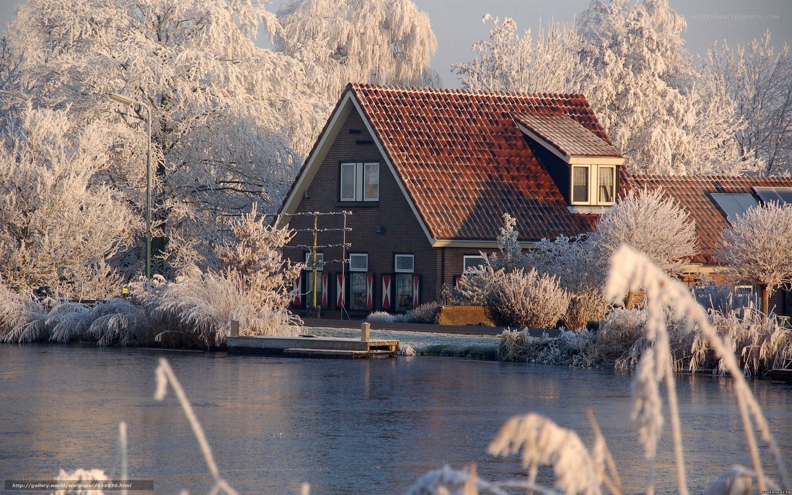 Frosty house by the water