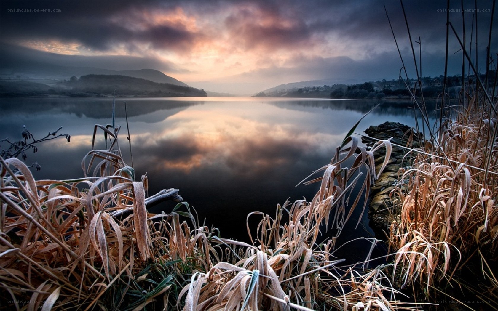 Frosty lake at sunrise