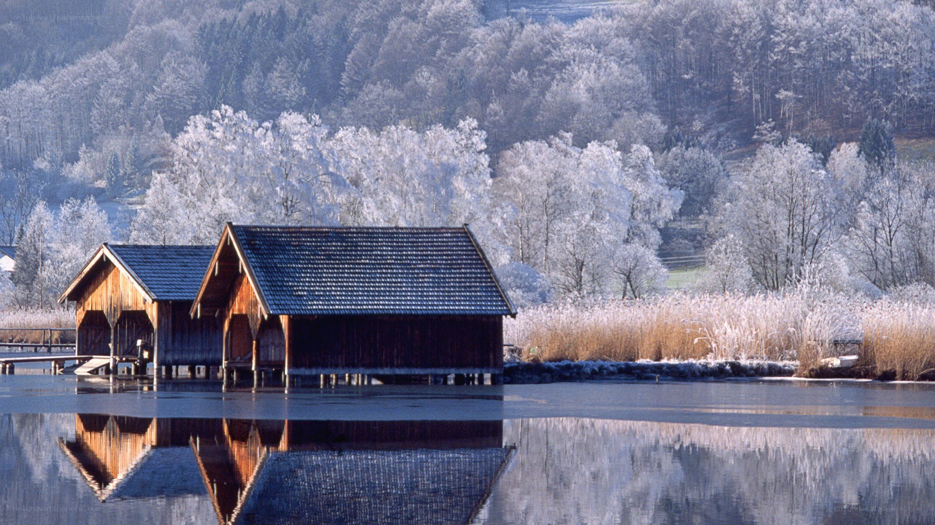 Frosty lake house reflection