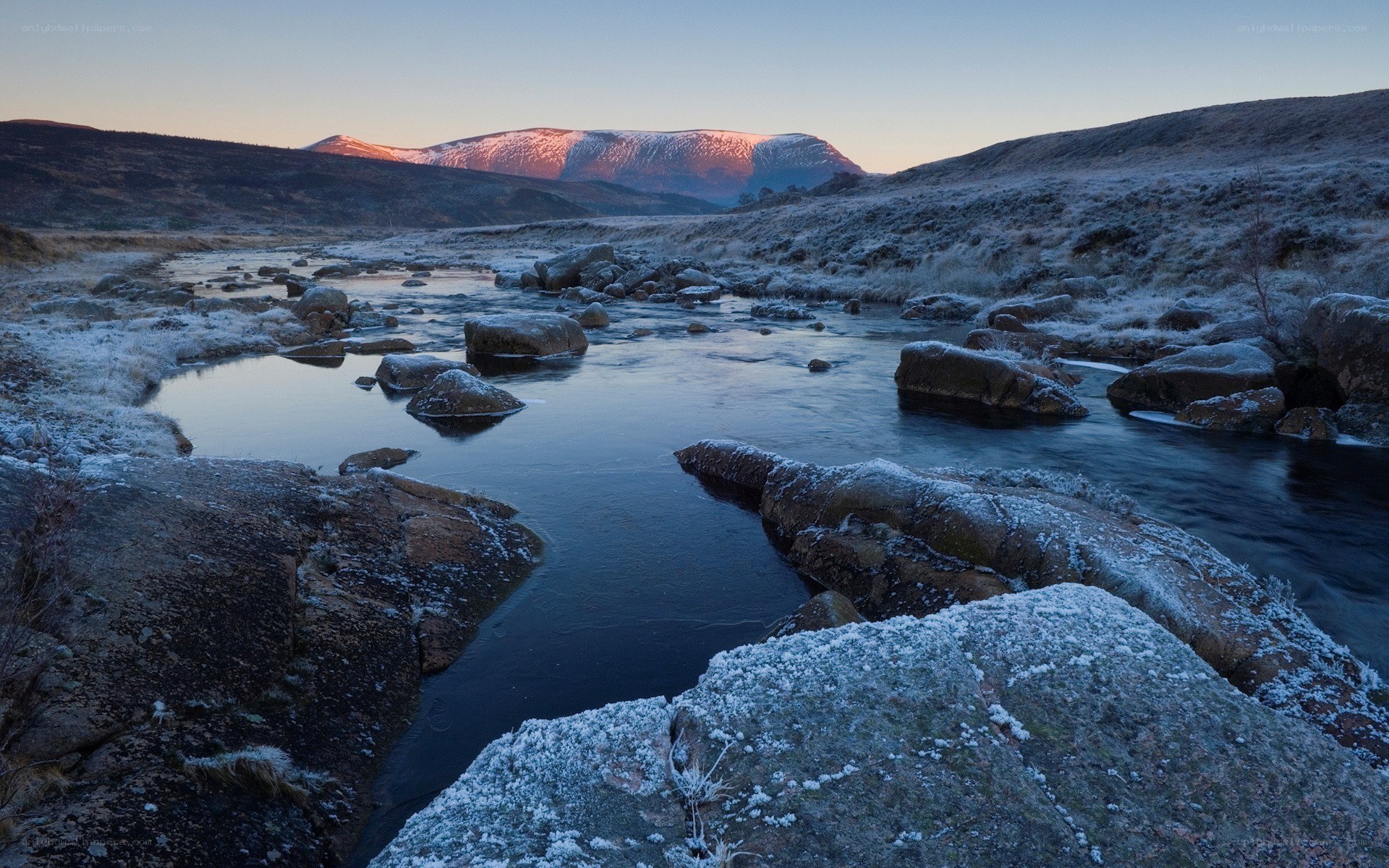 Frosty river at dawn