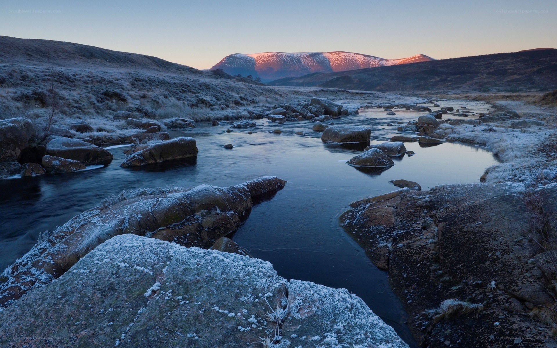 Frosty river at dawn