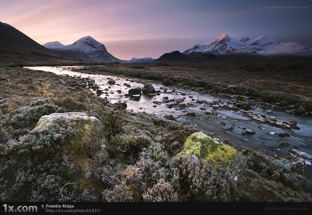 Frosty river at dawn in mountains