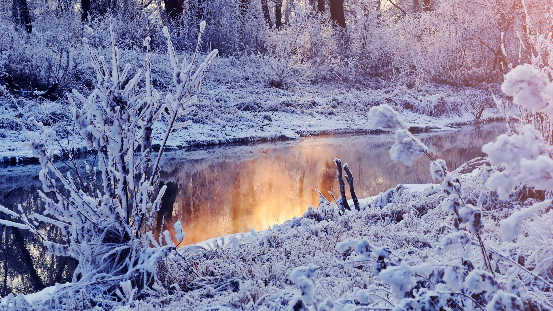 Frosty river at sunrise