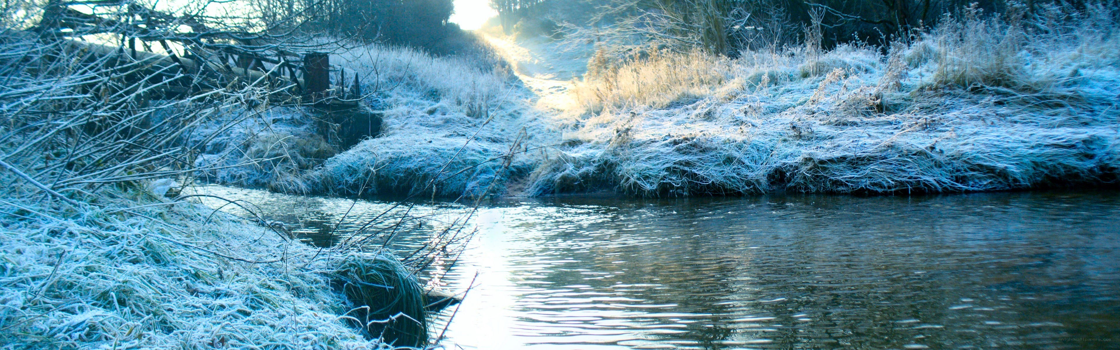 Frosty river at sunrise