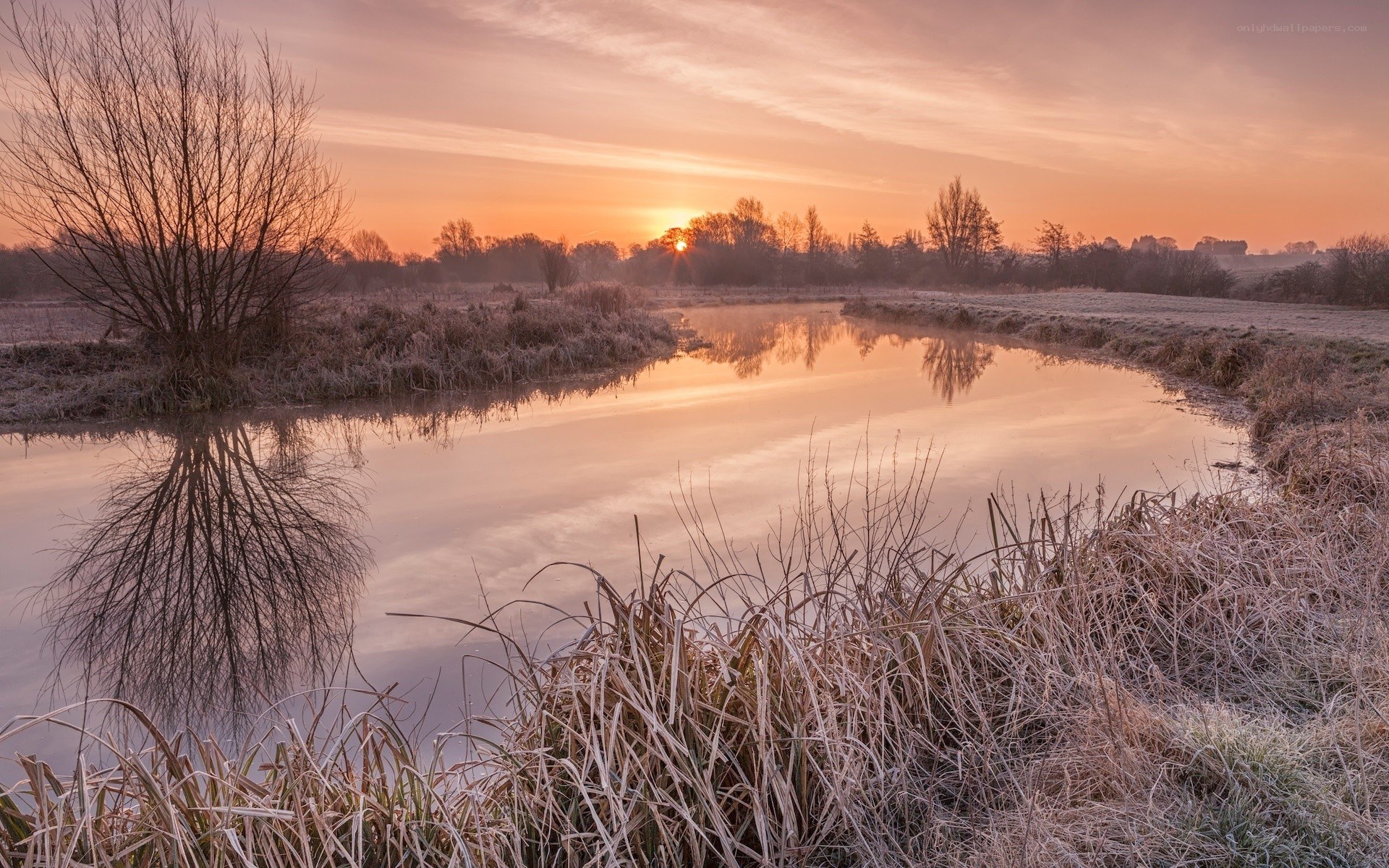 Frosty river at sunrise