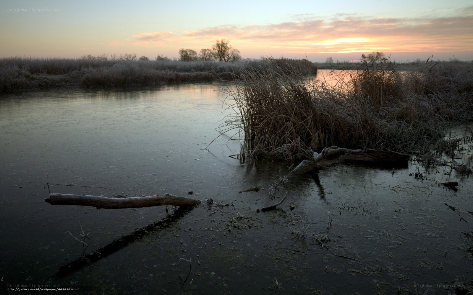 Frosty river at sunset