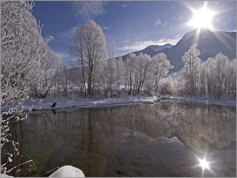 frosty river in mountain valley