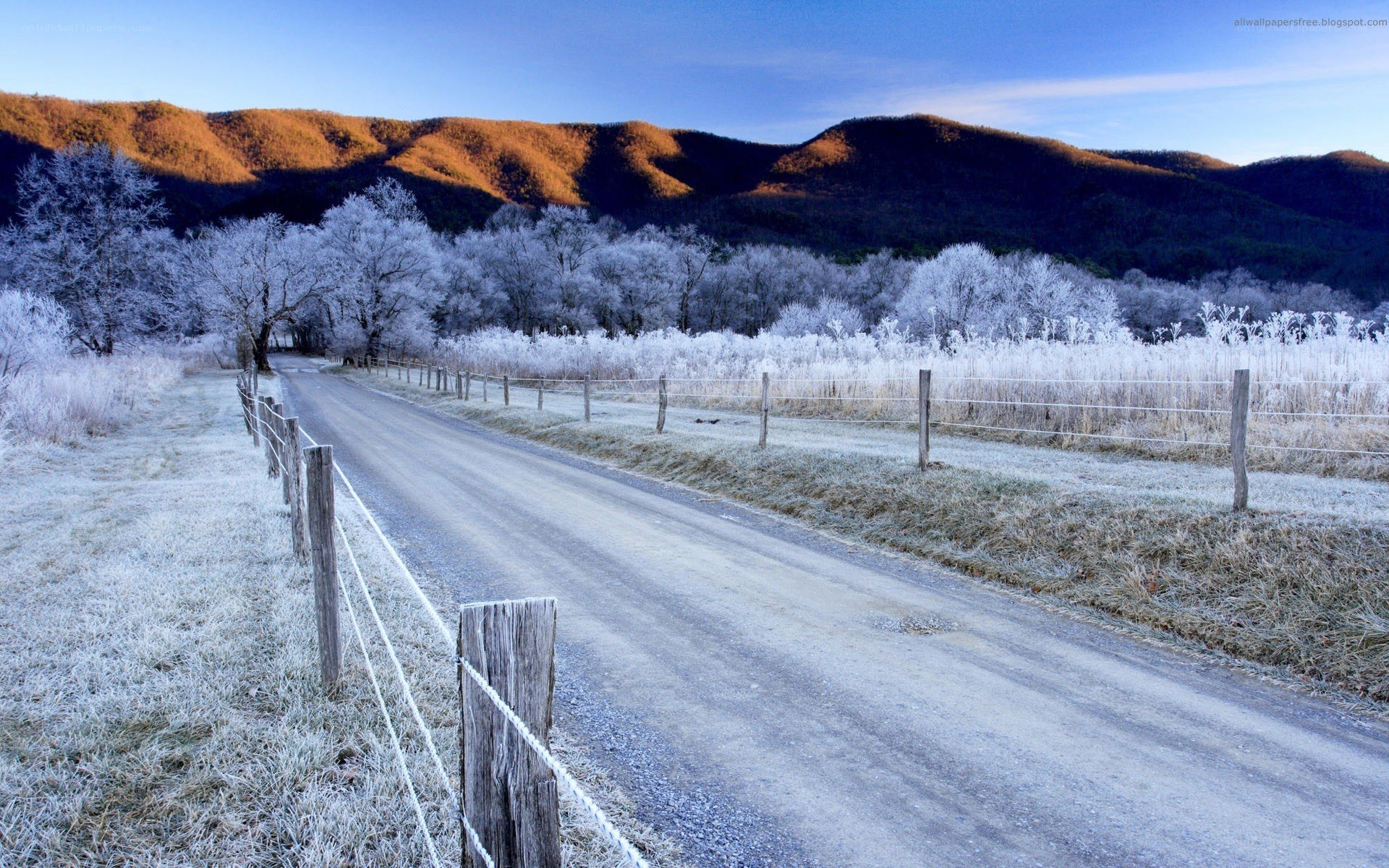 frosty road in mountain valley