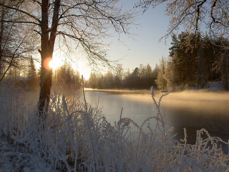 frosty sunrise over a frozen lake