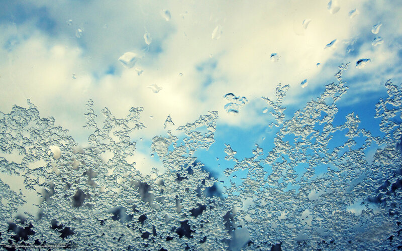 frosty window with sky view
