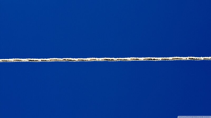 Frosty Wire Against Blue Sky