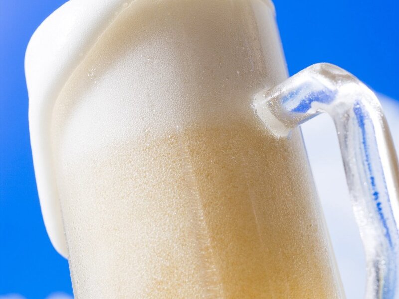 frothy beer in a mug