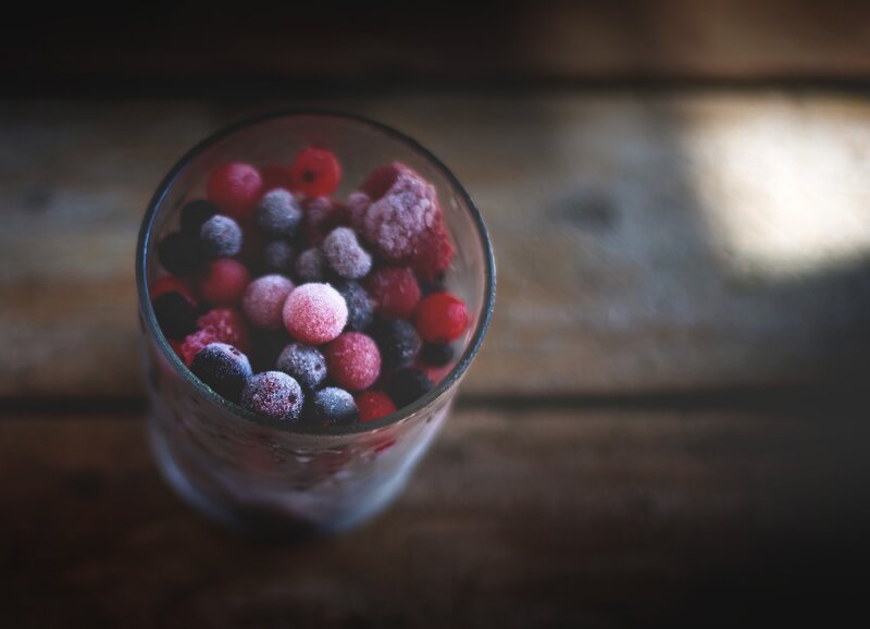 frozen berries in a glass